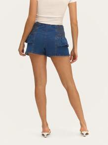 Nöista Short en jean taille haute volantée avec détails sur les côtés, créant un look ludique et féminin pour les sorties décontractées d'été. - Jean brut - Voir 2