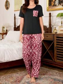 SHEIN Conjunto de pijama para mujer con estampado, de cuello redondo, manga corta y pantalón largo
