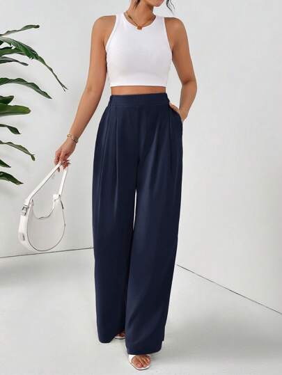 SHEIN Frenchy Pantalones casuales sueltos con bolsillos plisados y unicolor básico para mujer
