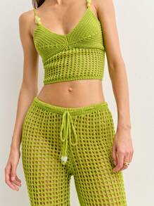 Nöista Los pantalones de ganchillo se caracterizan por un diseño de tejido abierto, cintura con cordón y piernas acampanadas para un aspecto relajado y bohemio. Perfectos como cubrecosturas para la playa o para combinarlos con estilo en festivales y escapadas soleadas con un Charm sin esfuerzo. - Verde - Ver 4