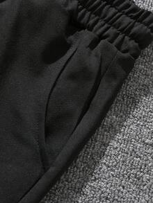Manfinity Roghcode Men's Solid Color Drawstring Waist Pocket Loose Casual Shorts - Black - View 4