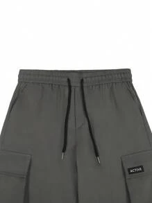 Manfinity LEGND Pantalones casuales de carga con cintura elástica para hombre, pantalones tipo cargo jogger de estilo carga para hombres