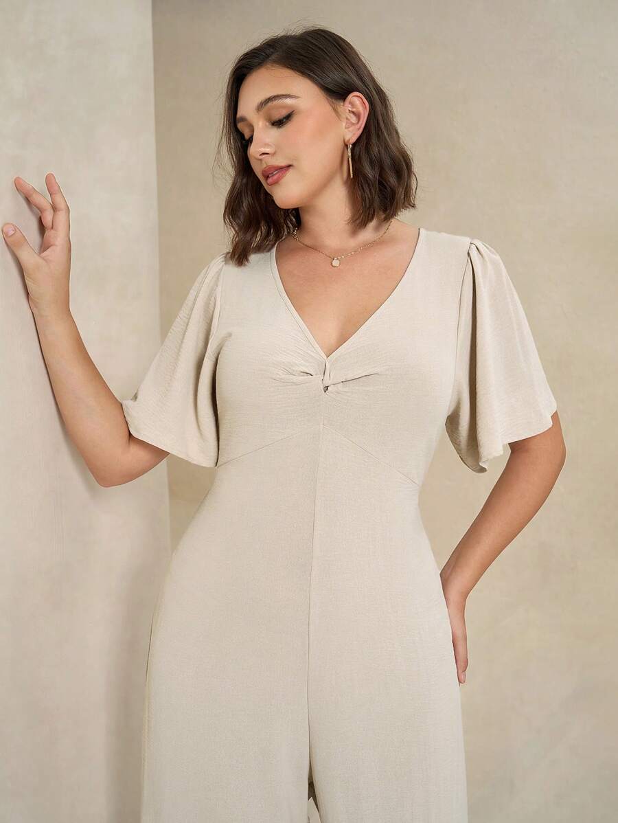 Chikora جمبسوت غير رسمية فاخرة ذات ياقة على شكل V مع تويست على الخصر للنساء مقاسات كبيرة