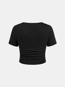 SHEIN Conjunto informal de niña preadolescente con camiseta de cuello redondo de manga corta en unicolor y pantalones anchos con estampado de leopardo