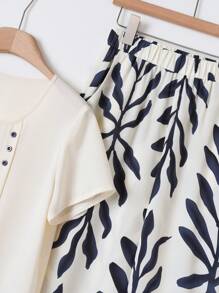 EMERY ROSE Conjunto de dos piezas para mujer de blusa de manga corta de cuello redondo en unicolor y pantalones de pierna ancha con estampado floral para el verano