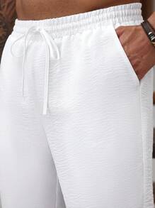 Manfinity RSRT 大码男士纯色抽绳腰休闲白色长裤，带口袋