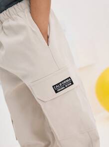 SHEIN Quần Cargo cạp giữa đơn giản thoải mái cho bé trai có túi và gấu quần - Màu be - Xem 4