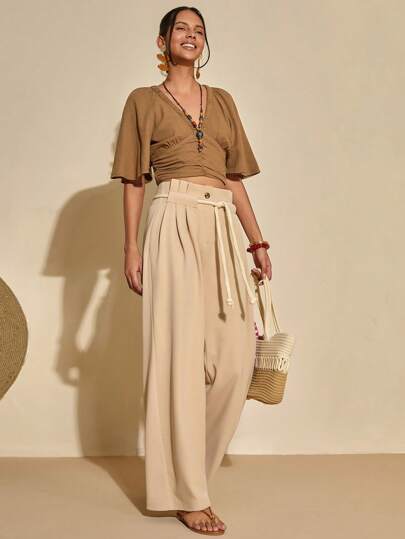 Bóhologie Pantalones de pierna ancha con detalles de bolsillo y lazo en la parte frontal en unicolor plisado para mujer