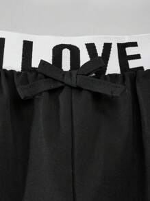 SHEIN Conjunto de niña preadolescente con top sin mangas con adorno de lazo y ribete de contraste, y pantalones cargo