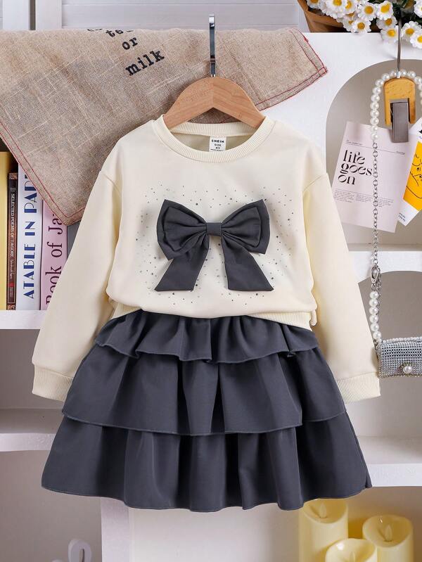 SHEIN 2 Stücke Set mit Kleine Mädchen Sweatshirt Top mit Schleife und Torten Rock für Herbst 2024, Outfit-Set