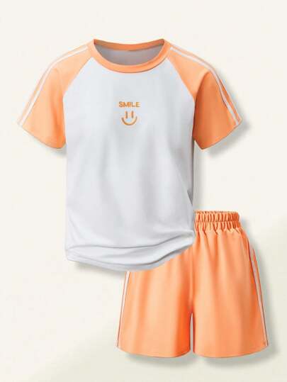 SHEIN Explorewe 2 Pieces Casual Fashion Campus Streetwear Tween Girls Teen Smiling Face Print Short Sleeve Top And Shorts Set, Spring/Summer