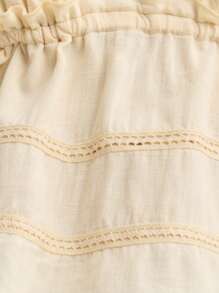 Nöista V领荷叶边上衣，饰有蕾丝边，腰部可调节。非常适合夏季、音乐节或打造可爱的七月四日造型。 - 杏色 - 查看 10