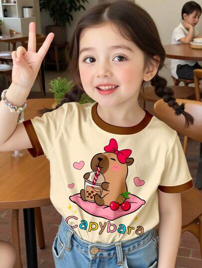 SHEIN Happikins Kids' Graphic T-Shirts, Cute Capybara Print, Anime Cartoon Animal Bow & Heart Print, Young Girls Casual Minimalist Round Neck Short Sleeve T-Shirts, Suitable For Summer