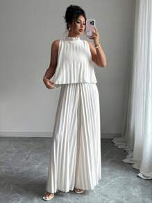 Elenzga Women's Sleeveless Crew Neck Pleated Elegant Romantic Jumpsuit For Vacations - Apricot - View 3