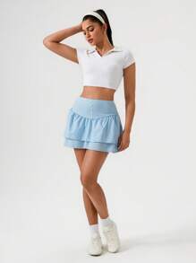 Hanevo Gonna sportiva da tennis da donna con doppio strato di orlo e decorazione a bottoni, colore azzurro chiaro - celeste - Visualizzare 3