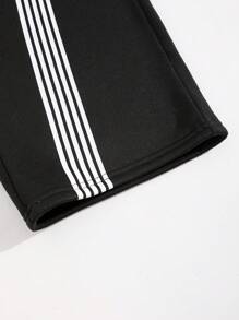 Tween 男童黑色街头拼色印花运动裤，舒适、时尚、百搭、面料柔软，非常适合日常、上学、旅行和户外活动