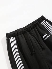 Tween 男童黑色街头拼色印花运动裤，舒适、时尚、百搭、面料柔软，非常适合日常、上学、旅行和户外活动