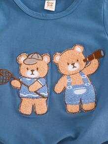 Cozy Pixies حزمة من قطعتين زي رضيع صبي بتصميم الدب الكرتوني الصوف الناعم و الجسم المحبوك قطعة رومبر وشورت الخصر المطاطي - متعدد الألوان - مشاهدة 6