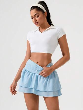 Hanevo 女式浅蓝色双层下摆纽扣装饰运动网球健身裙