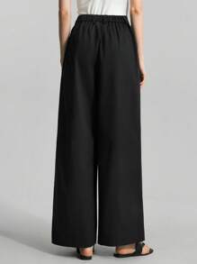 Ontre Pantaloni alla zuava avvolgenti con gamba ampia in tinta unita neri, abbigliamento estivo casual da donna, outfit casual femminili