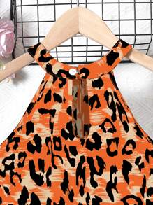 SHEIN Conjunto de top halter con hombros descubiertos y estampado de leopardo, talla grande pantalón corto con decoración de botones, para niños en verano - Naranja - Ver 6