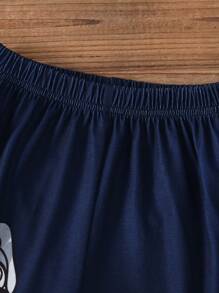 Conjunto informal de 2 piezas de camiseta de manga corta con cuello redondo y estampado de dibujos animados y pantalones cortos para niño pequeño