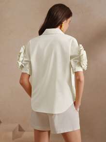 Anewsta Camisa de mujer de verano de un solo pecho con decoración floral 3D en un solo color