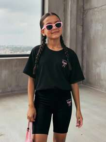 SHEIN 少女“寻找内心平静”蝴蝶结印花圆领宽松T恤和弹力短裤两件套，休闲夏季套装 - 黑色 - 查看 8