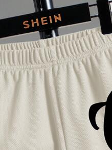 SHEIN Pantalones cortos deportivos de punto con diseño de patrón deportivo con ajuste holgado para niño preadolescente, pantalones cortos de baloncesto