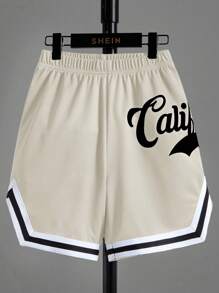 SHEIN Pantalones cortos deportivos de punto con diseño de patrón deportivo con ajuste holgado para niño preadolescente, pantalones cortos de baloncesto