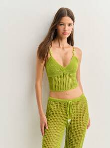 Nöista Top lavorato a maglia e uncinetto abbinato a pantaloni dello stesso colore