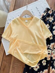 Conjunto de 2 piezas de niña preadolescente con camiseta de manga corta con cuello en V minimalista y conjunto de pijama informal con estampado floral retro