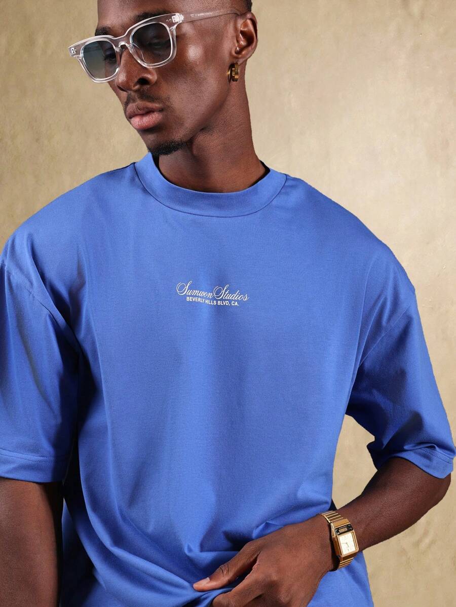 SUMWON قميص كاجوال زائد الحجم من بيفرلي هيلز بوليفارد مصنوع من قطن الجيرسيه، ملابس استرخاء رياضية بطراز الشارع الصيفي المريح - أزرق غامق - مشاهدة 1