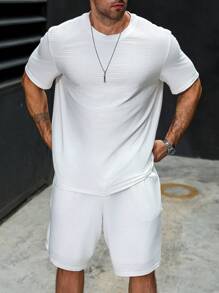Manfinity Homme Set de 2 piezas Camiseta de manga corta de cuello redondo blanca con ajuste holgado y pantalones cortos con cordón elástico para hombres de talla grande