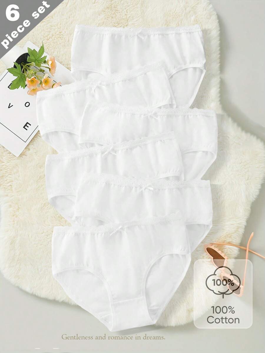 Mutandine da ragazza in cotone morbido e traspirante, con decorazione in pizzo e fiocco, di colore bianco uniforme, minimal e alla moda