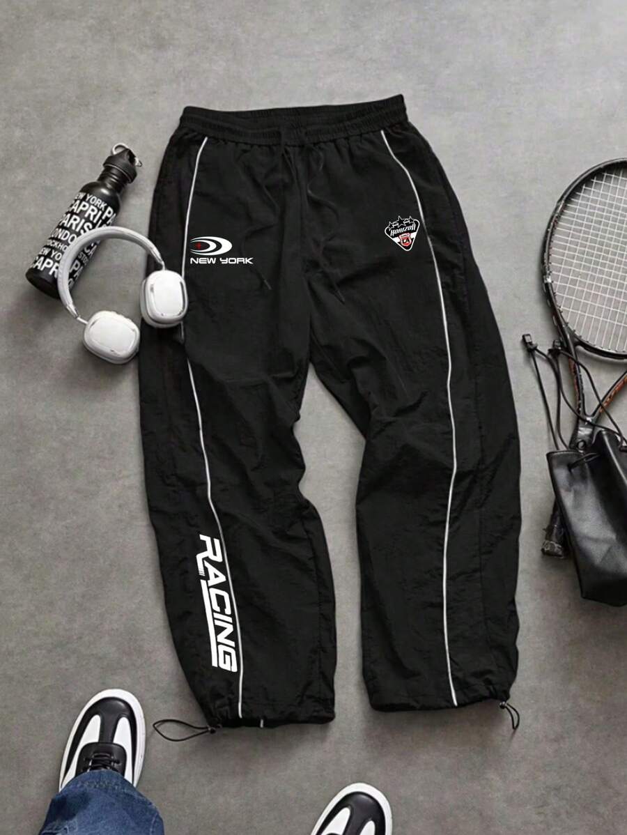 Sport MetroGents Pantalones deportivos minimalistas estampados para hombres, cómodos, ultraligeros y holgados para el gimnasio, pantalones de chándal - Negro - Ver 1