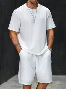 Manfinity Homme Set de 2 piezas Camiseta de manga corta de cuello redondo blanca con ajuste holgado y pantalones cortos con cordón elástico para hombres de talla grande