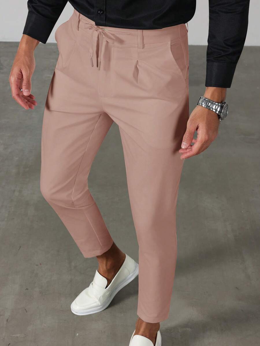 Manfinity Bizformal 男士商务休闲风，INS推荐一款高性价比的特色裤装。腰部系带设计，适合商务通勤、宴会和日常穿着。也是送给男朋友或老公的理想礼物。男士纯色抽绳腰商务休闲正装裤，休闲裤 - 粉色 - 查看 1