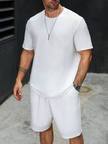 Manfinity Homme Set de 2 piezas Camiseta de manga corta de cuello redondo blanca con ajuste holgado y pantalones cortos con cordón elástico para hombres de talla grande