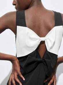 Maija 女士黑白对比蝴蝶结装饰黑白连衣裙，百搭夏季/四季优雅休闲都市时尚设计，舒适合身的V字后背蝴蝶结点缀黑白拼布A字连衣裙，优雅的女士服装，适合音乐会的可爱装扮，商务休闲办公装，低调的老钱风格，高端时尚都市通勤，编辑的最爱，城市社交/度假聚会派对礼服，迷人的毕业季短裙商务休闲女装，办公装，低调的老钱风格，毫不费力，高端都市通勤，与杂志主编同款风格，都市社交度假派对装，迷人，低调的基本款风格，百搭而不挑剔的服装，街头时尚服装，服装，咖啡店，休闲装