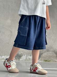 Young Boys Casual Solid Color Loose Cargo Shorts With Big Pockets, Elastic Waist, Minimalist Versatile Bottom Wear Suitable For School, Birthday Parties, Performances, Weddings, Baptisms, School Openings, Daily Wear, Spring And Summer