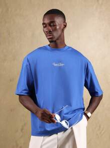 SUMWON قميص كاجوال زائد الحجم من بيفرلي هيلز بوليفارد مصنوع من قطن الجيرسيه، ملابس استرخاء رياضية بطراز الشارع الصيفي المريح - أزرق غامق - مشاهدة 2