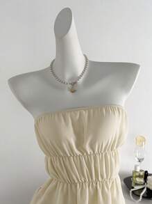 Zolique Summer Sexy Strapless Solid Color Ruffled Cropped Top And Mini Skirt 2 Pieces Set - Apricot - View 3