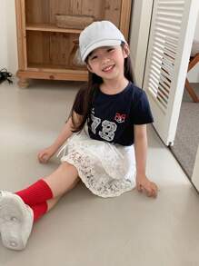 Bộ 2 món cho bé gái, gồm áo thun ngắn tay in họa tiết cổ tròn và chân váy ren thắt nơ, thích hợp mặc mùa hè. - Màu xanh lam - Xem 4