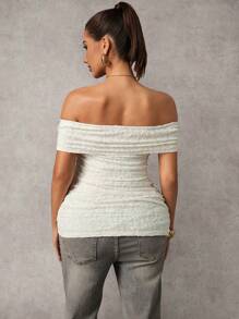 MaterniChic Elegante maglietta premaman con spalle scoperte, tinta unita, con tessitura jacquard