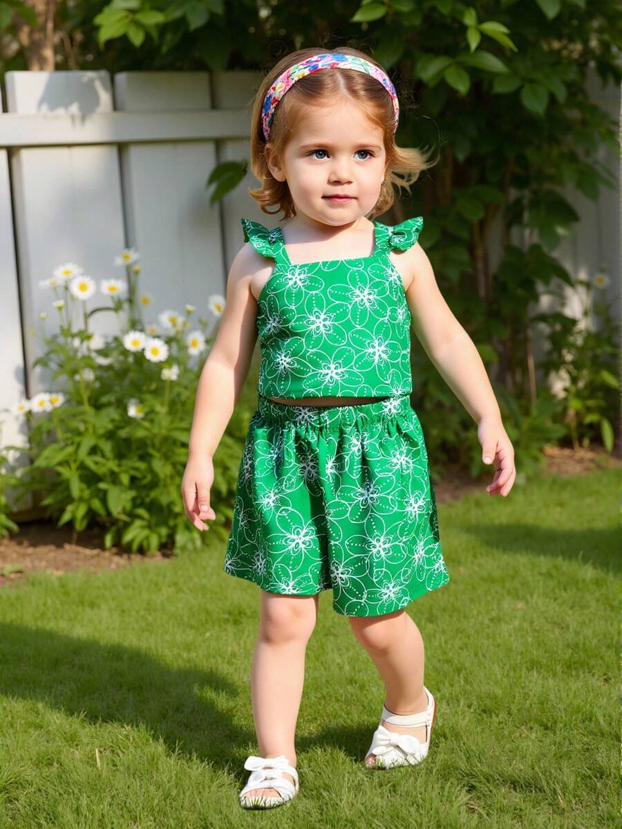 SHEIN Set 2 bucăți pentru fete tinere: top cu mâneci tip șapcă cu imprimeu floral și pantaloni scurți, casual