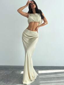 Firerie Women's Elegant Sophisticated Romantic Fashion New Holiday Party Music Festival Daily Draped Lapel Sleeveless Cropped Shirt Top And Low Waist Pleated Super Long Skirt Apricot 2 Pieces Set - Apricot - View 2