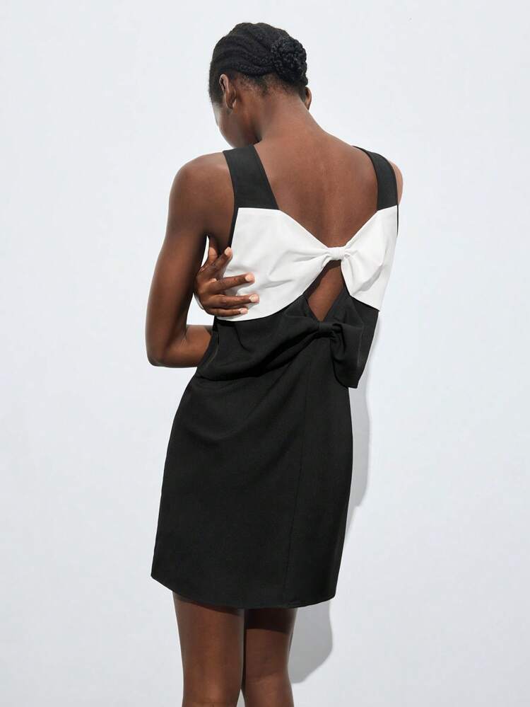 SHEIN Maija Ladies' Black & White Contrast Bowknot Decor Black And White Dress, Versatile Summer/All Season Elegant Casual Urban Fashionable Design, Comfortable Fitted V-Back Bow Accented Black & White Patchwork A-Line Dress, Graceful Ladies' Outfit, Cute For Music Concerts, Business Casual Office Wear, Low-Key Old Money Vibe, High-End Stylish Urban Commute, Editor's Favorite, City Social/Vacation Gathering Party Dress, Charming Graduate Season Short Dress Business Casual Women's Wear, Office Wear, Low-Key Old Money Style, Effortless , High-End Urban Commuting, The Same Style As The Editor-In-Chief Of The Magazine, Urban Social Vacation Party Wear, Charming, Low-Key Basic Style, Versatile And Not Picky Clothing, Street Fashion Wear, Clothing, Coffee Shop, Relaxed Wear