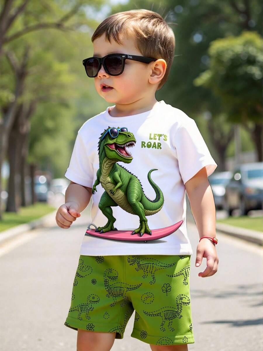1 套幼儿男孩卡通印花服装,白色 T 恤搭配太阳镜和冲浪恐龙印花“LET'S ROAR”,绿色短裤搭配全身恐龙线条印花,短袖 T 恤和短裤套装,可爱的春夏日常穿着 - 彩色 - 查看 1