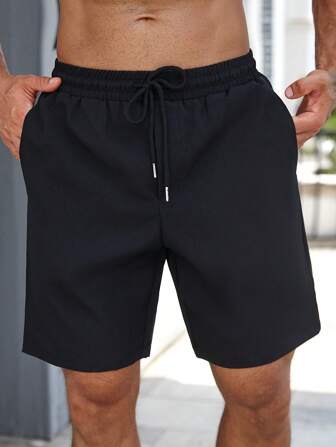 Manfinity Homme Pantalones cortos casuales de color liso con cordón para hombres